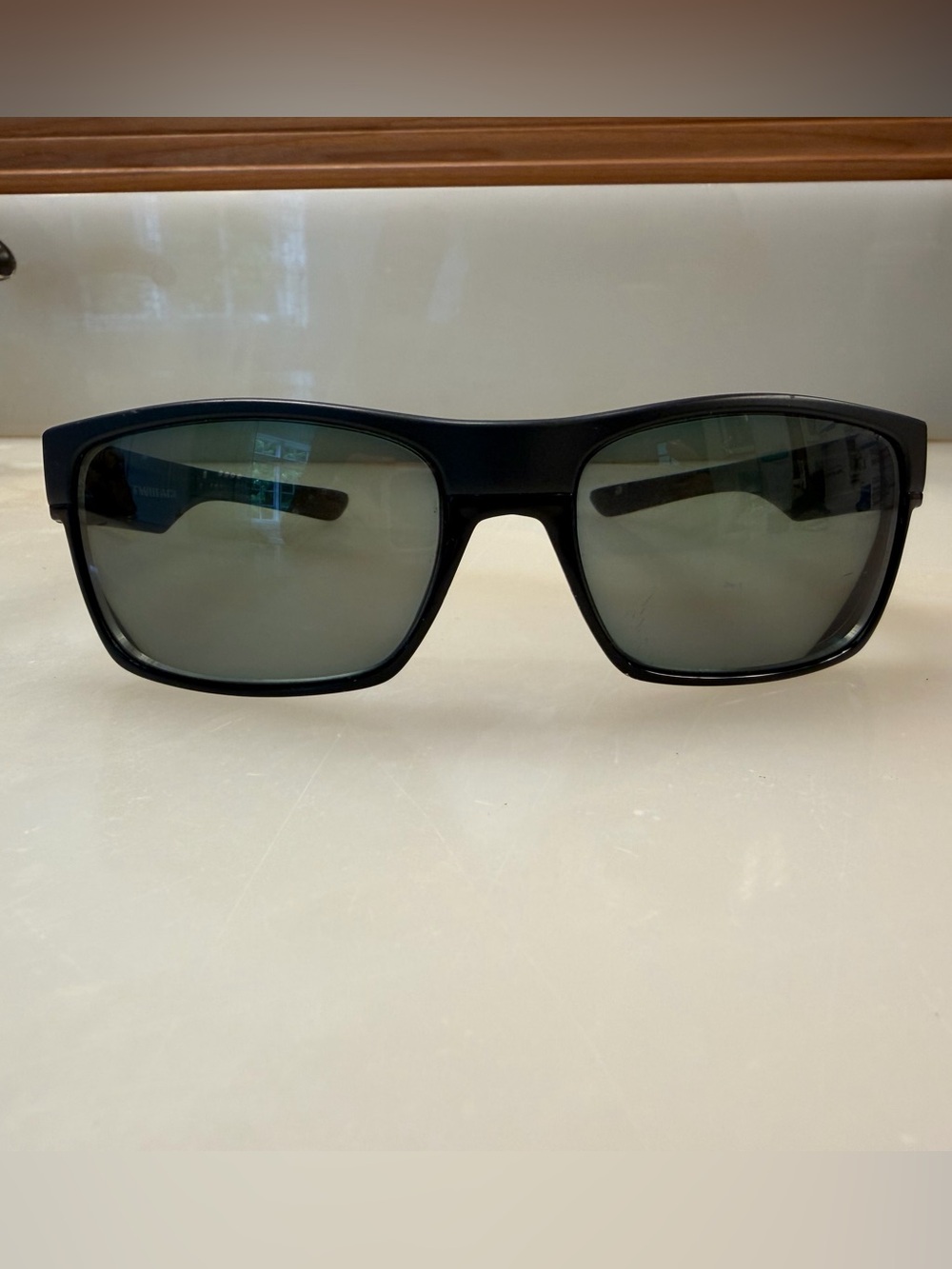 Oakley Black Framed Sunglasses w/ Grey Lenses